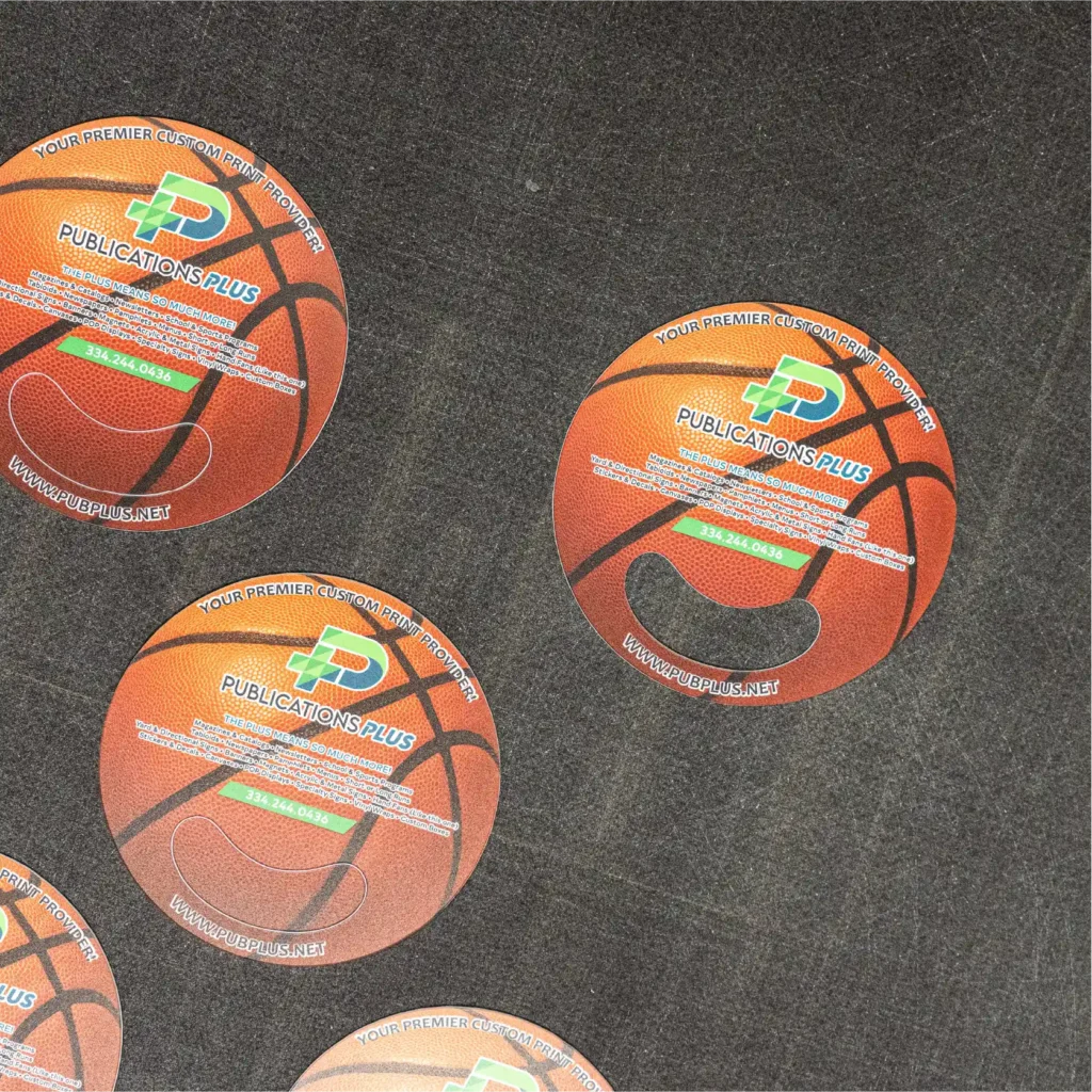 Circular hand fans for basketball team.
