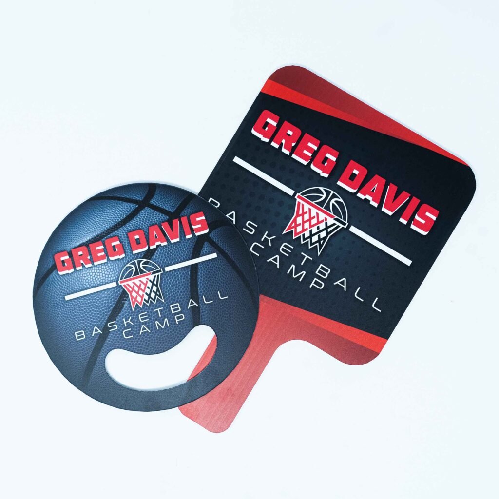 Circular and square hand fans for basketball team.