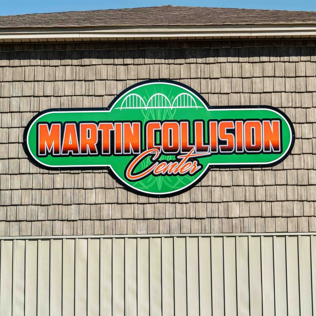 Outdoor sign on wall.