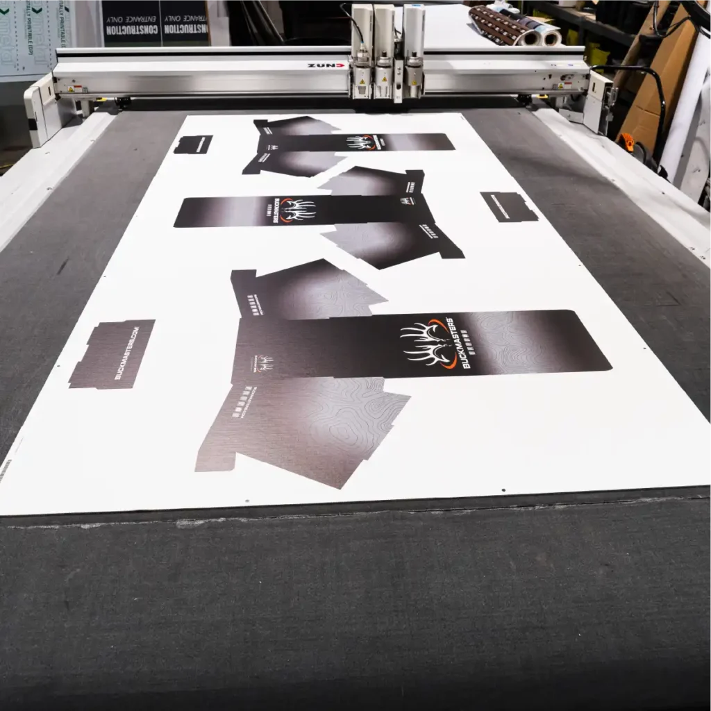 Cardboard on CAD cutting table.