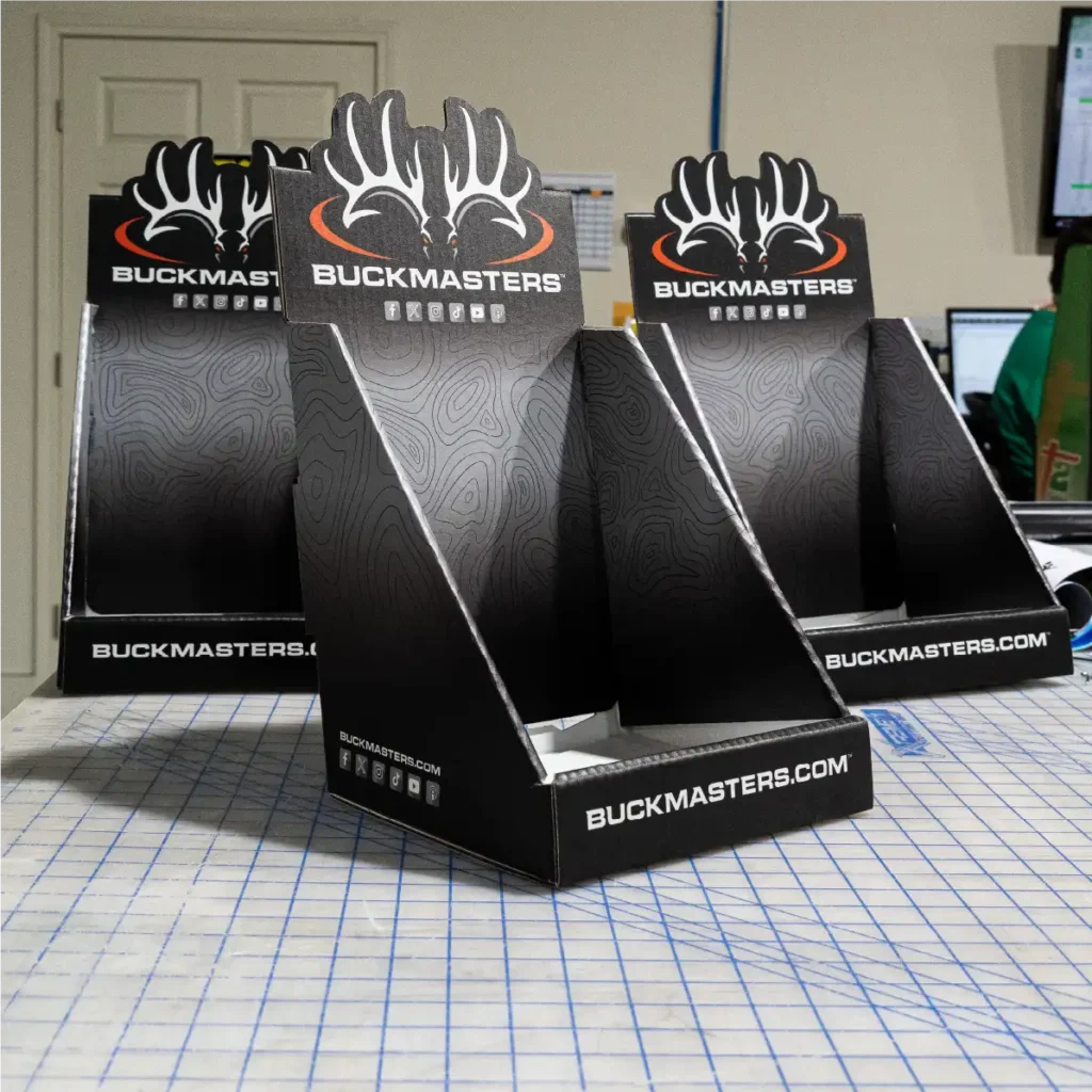 Three point-of-purchase displays for magazines.